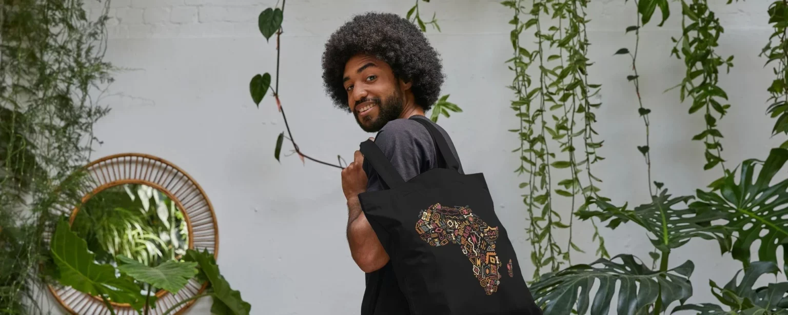 man carrying a CTAOP tote bag