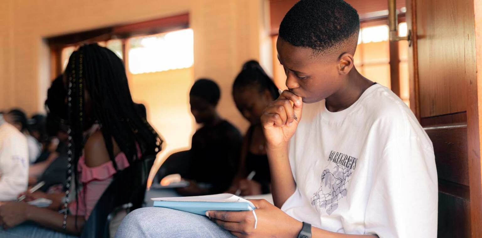 Young man studying intently